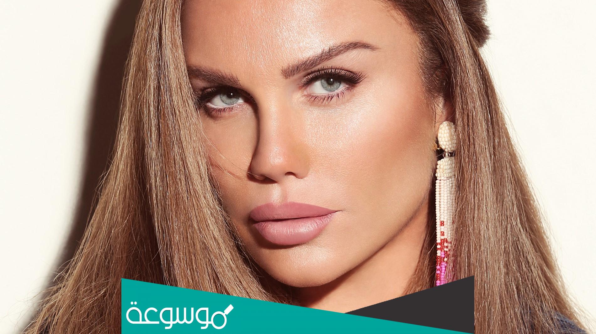 عايشة سني وبغني وبحب الحياة كلمات