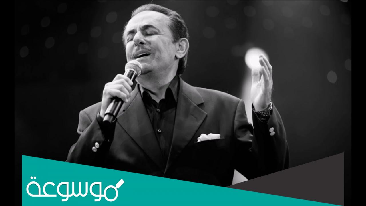 على بابي واقف قمرين كلمات